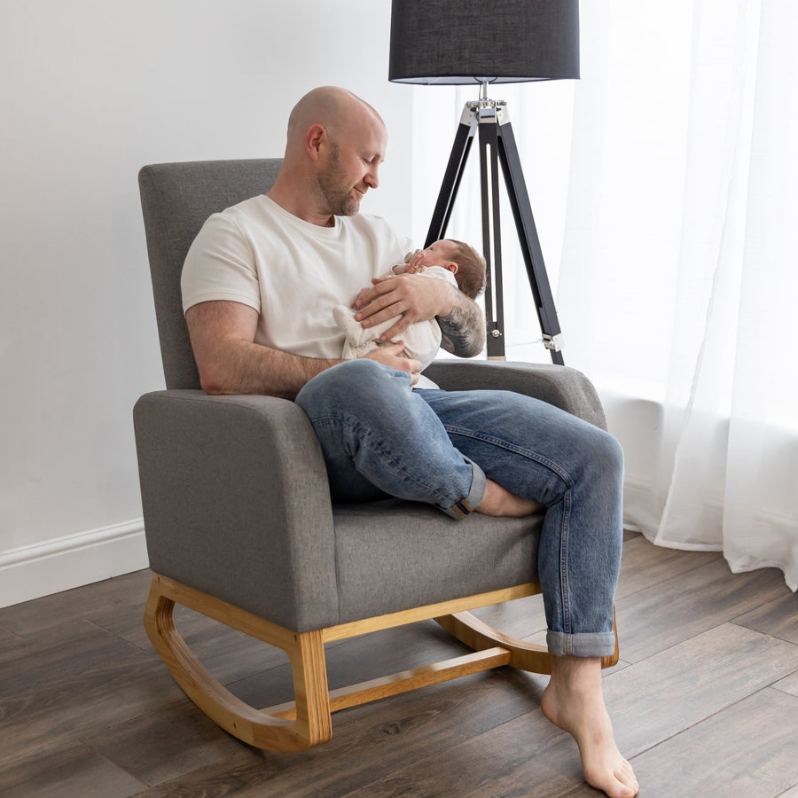 Dad holding his baby in the Askern rocking nursing chair