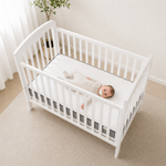 lifetyle baby laying on signature kub mattress