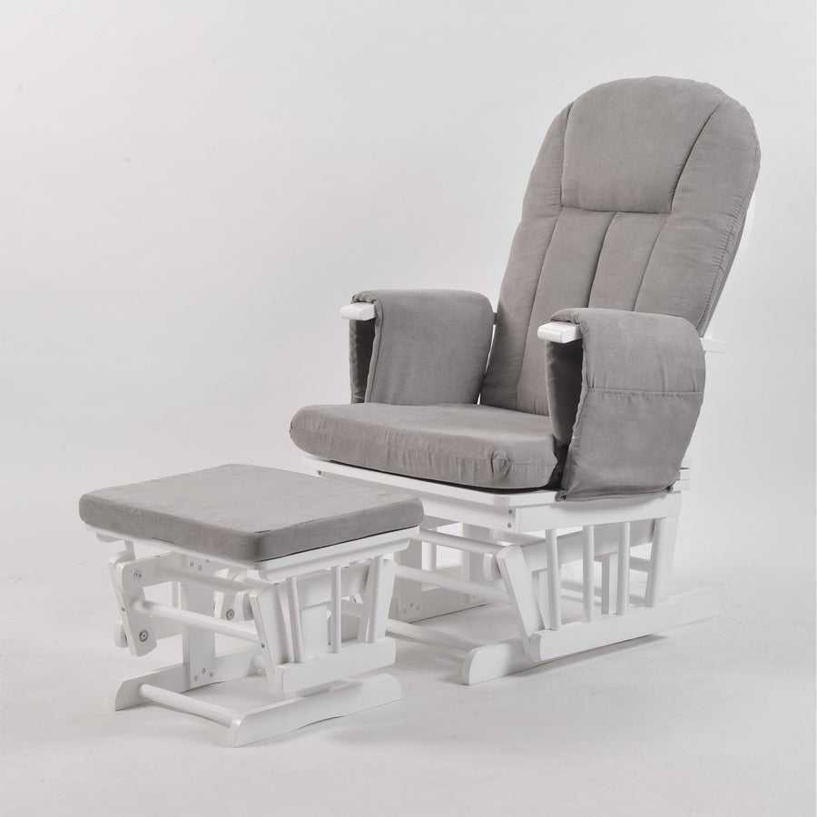 Nursing chair styled in a compact nursery corner