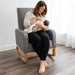 Mum feeding baby on rocking chair